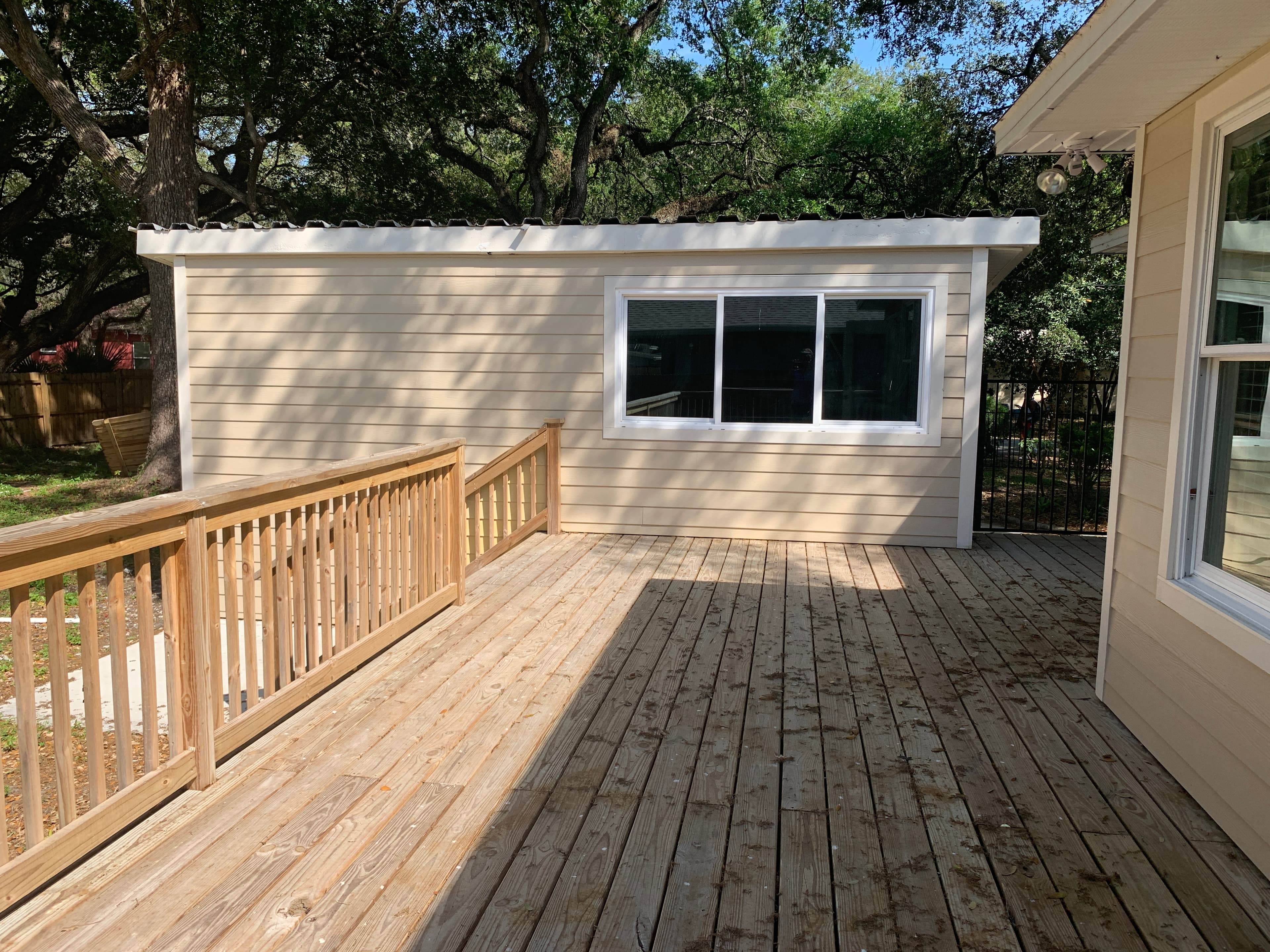 Completed deck addition with fiber cement siding — Blue Diamond Building