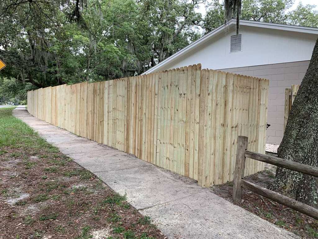 Wood privacy fence from side angle — Blue Diamond Building, Northeast Florida