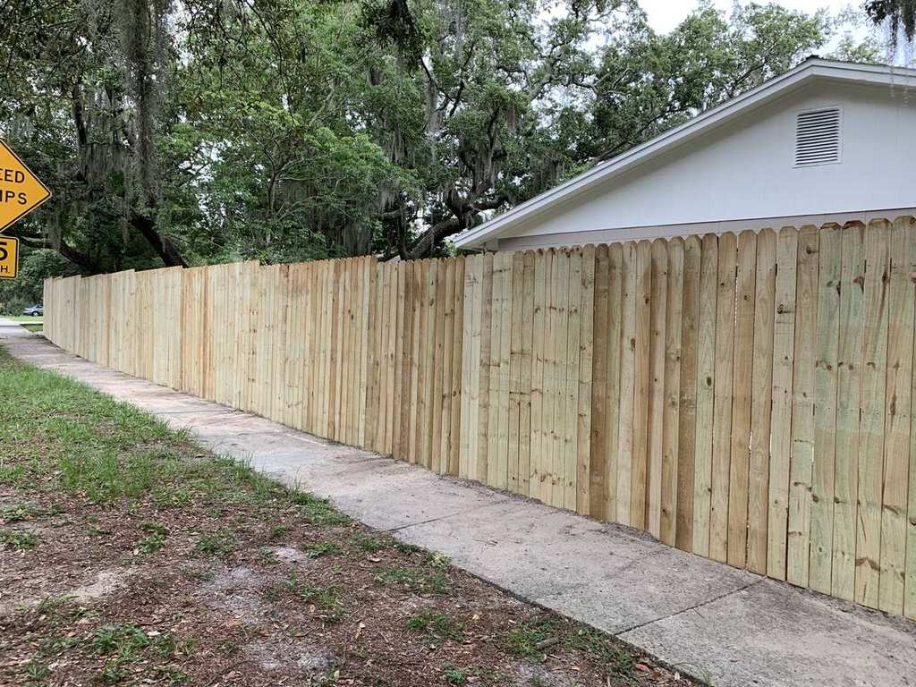 Full run of wood privacy fence — Blue Diamond Building completed project