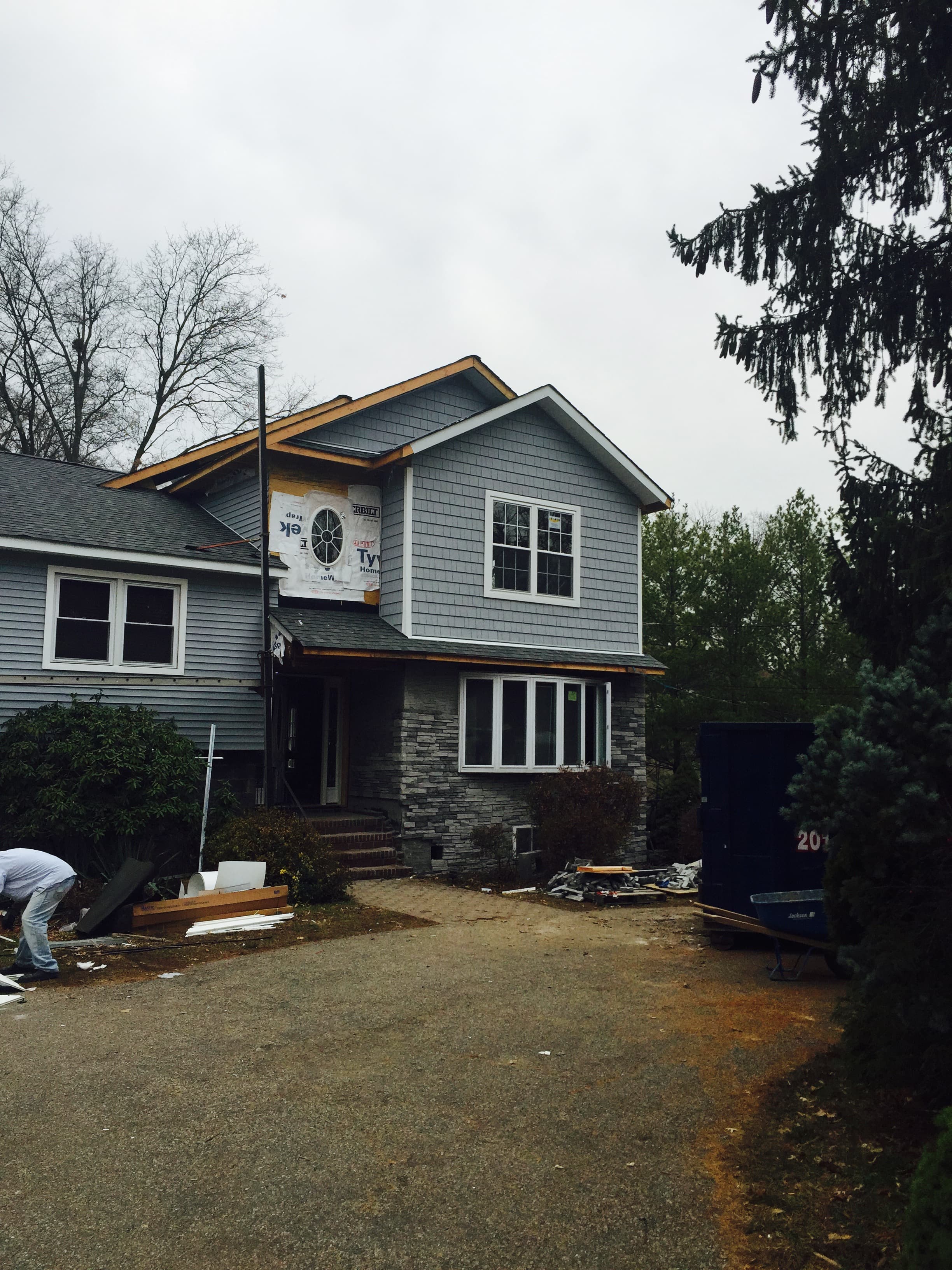 Gray shingle siding with stone accent exterior — Blue Diamond Building